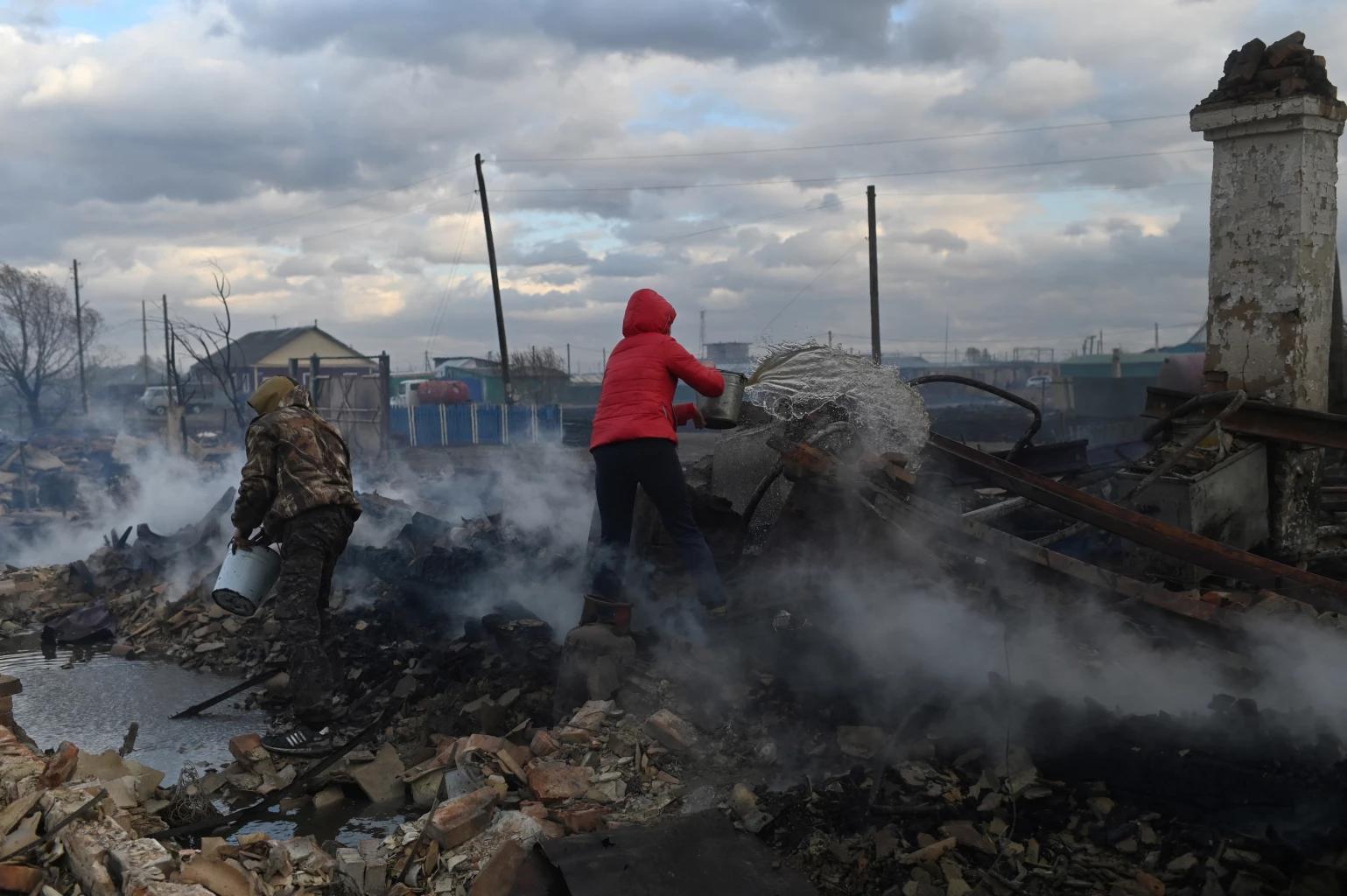 Fires kill at least 8 in Siberia, high winds hamper extinguishing efforts